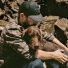 Filson Alaskan Guide Shirt Otter Green/Black Plaid lifestyle with dog