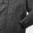 Filson Chore Coat Faded Black, 4-hole button front closure with adjustable cuffs