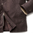 Filson Dry Wax Short Field Jacket Dark Brown snap-secure zipper guard and adjustable cuffs