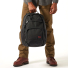 Filson Dryden Backpack 20152980 Dark Navy carried in hand