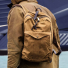 Filson Journeyman Backpack 11070307 Tan carrying on the shoulder