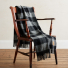 Pendleton Motor Robe with Leather Carrier Rob Roy Charcoal on chair