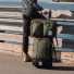 Topo Designs Global Travel Bag Roller Olive on the road