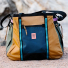 Topo Designs Mountain Gear Bag on rocky ground