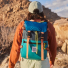 Topo Designs Rover Pack Classic multi color carrying on back