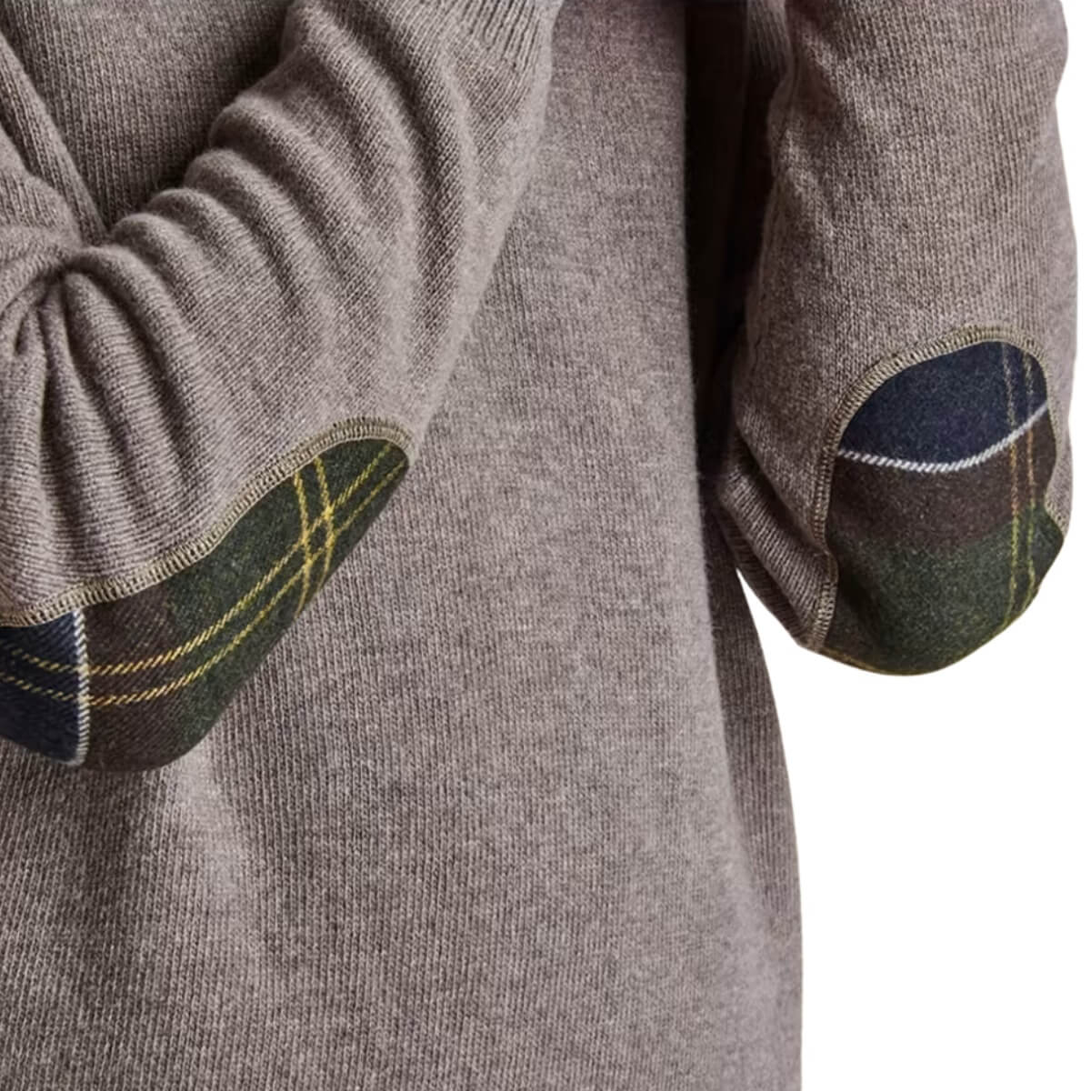 Deze Barbour trui is vervaardigd van 100% lamswol en biedt uitzonderlijke zachtheid en warmte.