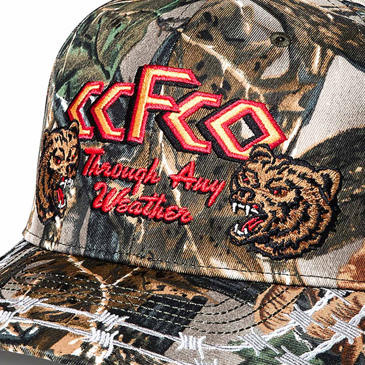 Filson Logger Cap Green Camo/Any Weather, een klassieke trucker cap met geborduurde logopatch – perfect voor outdoor en vrije tijd