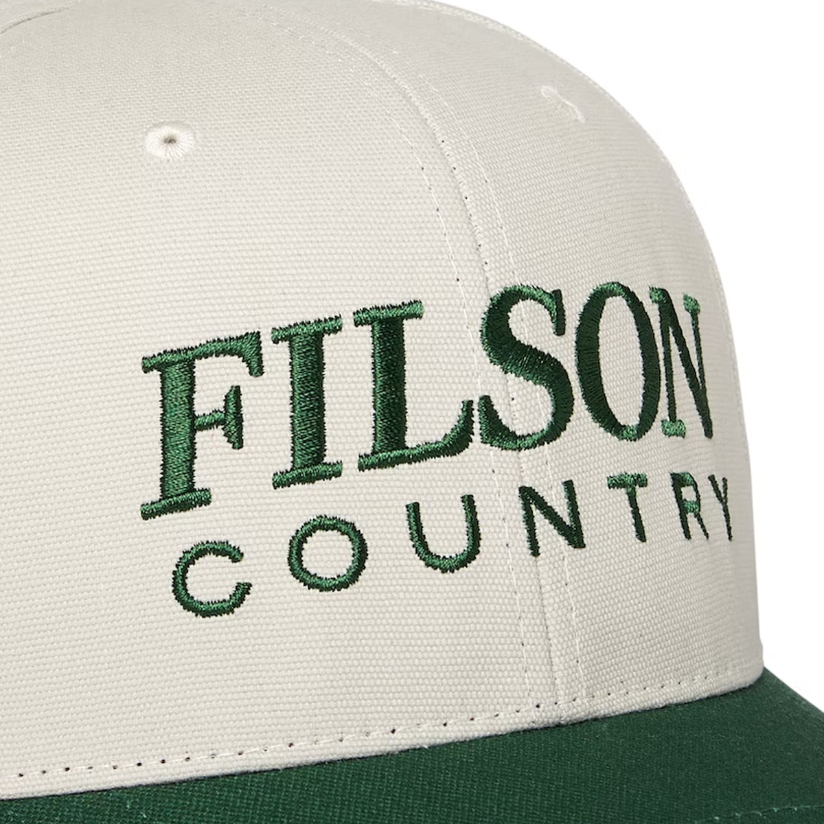 Filson Logger Cap Tan/Country, een zes-panel canvas cap voor comfort en jaren trouwe dienst