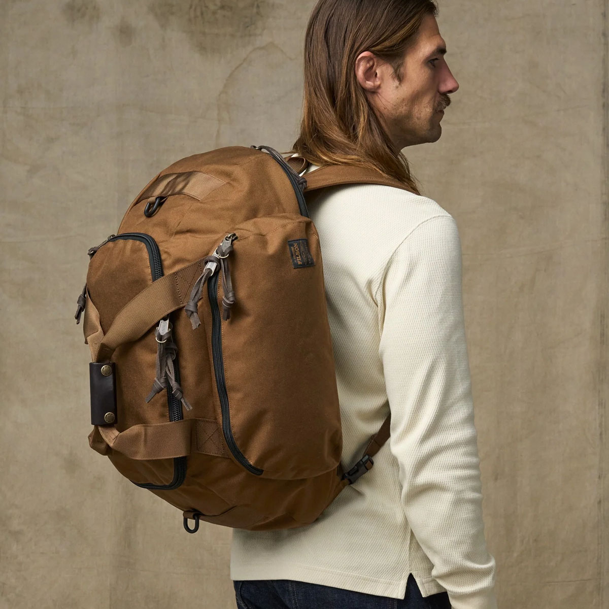 Filson Dryden Duffle Pack Whiskey, this Duffle Pack is built to be taken anywhere