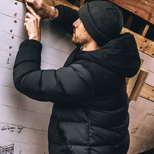 Filson Featherweight Down Jacket Faded Black, een uitzonderlijk warm, licht en pakbaar ganzendons jack