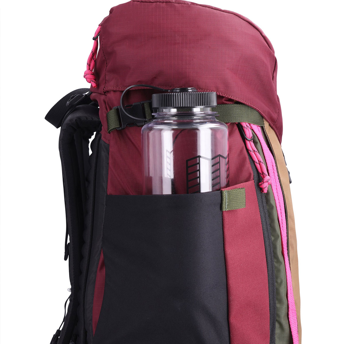 Topo Designs Mountain Pack 28L, side, large side pockets fit a 1.5 Ltr. water bottle