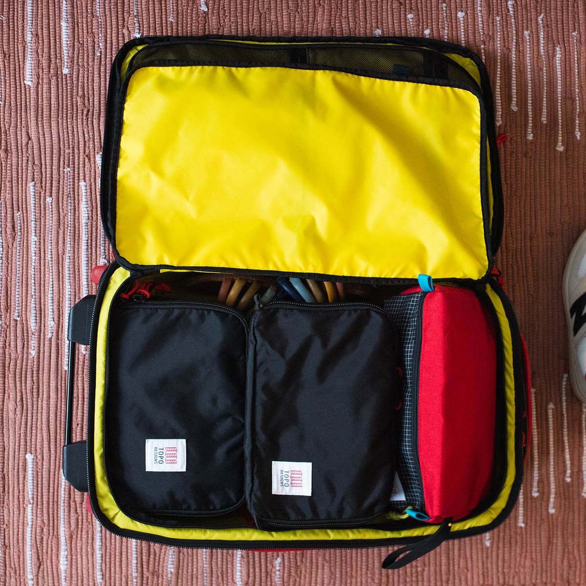 Topo Designs Pack Bag 5L Black, a simple, durable and highly functional way to organize your luggage